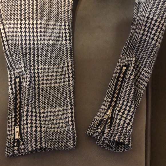 Black and white Checkered pants with zippers on the side of pants legs. - Picture 4 of 5